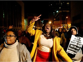 Protesters march through the streets after a mistrial was declared in the trial of Baltimore police Officer William G. Porter, December 16, 2015 in Baltimore, Maryland. The judge declared a mistrial on the third day of deliberations in Porter's trial, which is the first of six trials of police officers involved in the death of Freddie Gray.