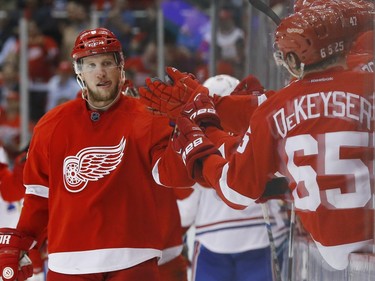 Detroit Red Wings left wing Justin Abdelkader (8) celebrates his goal against the Montreal Canadiens in the third period of an NHL hockey game Thursday, Dec. 10, 2015 in Detroit.