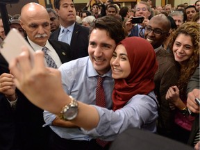 Justin Trudeau poses for a selfie with a supporter in Ottawa earlier this fall.
