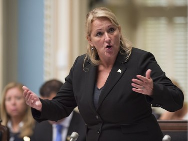 Quebec Public Security Minister Lise Theriault responds to the Opposition during question period, Wednesday, September 23, 2015 at the legislature in Quebec City.