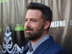 Could the permanent ink on his back symbolize a new beginning for Ben Affleck after the Garner years?
