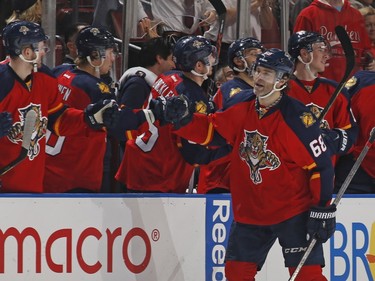 Jaromir Jagr #68 of the Florida Panthers i congratulated by teammates after scoring a second period goal against the Montreal Canadiens at the BB&T Center on December 29, 2015 in Sunrise, Florida.