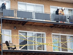 The collapsed balcony of a building located at the corner of Victoria St. and 33rd Avenue, in Lachine, Quebec, on Monday December 7, 2015, while the fire brigade conducts an inspection.  The incident happened around 2am on Sunday December 6, 2015 causing two fatalities and leaving one individual in critical condition. (Giovanni Capriotti / MONTREAL GAZETTE)