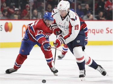 Montreal Canadiens Alex Galchenyuk, right, tries to slow down Washington Capitals Nicklas Backstrom during National Hockey League game in Montreal Thursday December 3, 2015.