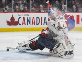 Montreal Canadiens Brian Flynn scores on Washington Capitals Braden Holtby during third period of National Hockey League game in Montreal Thursday December 3, 2015.
