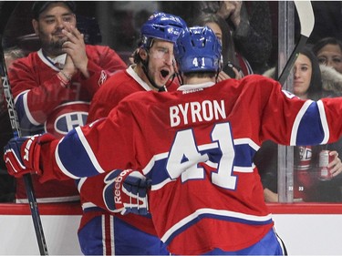 Montreal Canadiens Brian Flynn celebrates his third-period goal against the Washington Capitals with teammate Paul Byron during National Hockey League game in Montreal Thursday December 3, 2015.