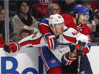 Montreal Canadiens Max Pacioretty wraps up Washington Capitals T.J. Oshie during third period of National Hockey League game in Montreal Thursday December 3, 2015.