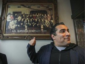 Guido Grasso's plumber father is in the photo next to the cash register at Café Olimpico. "I want people to know that if there is running water in this place, it’s because of my dad."