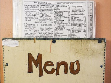 Menu dispenser at Moe's-Casse-Croute-du-Coin Friday, December 4, 2015. The 24-hour greasy spoon is set to close Monday, December 7, 2015 after, first Bessie Thomas, then the current owner, her son Eddy Thomas, failed to find a buyer.