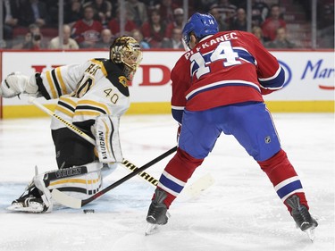 Montreal Canadiens Tomas Plekanec can't beat Boston Bruins goalie Tuuka Rask with a deflection during third period of National Hockey League game in Montreal Wednesday December 9, 2015.