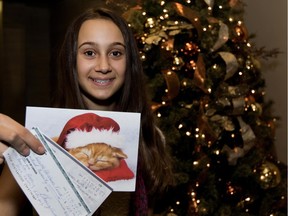 Olivia Lanni donates $170 to the Gazette Christmas Fund in Montreal on Friday, Dec. 11, 2015. She had recently turned 12 and asked her friends for donations instead of presents.