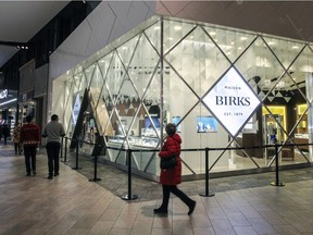 The Birks store in Carrefour Laval is cordoned off after a mid-day robbery at the shopping mall north of Montreal on Dec. 23, 2015.
