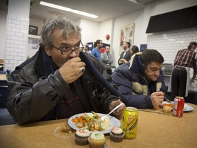 Eduardo enjoys a Christmas lunch at the Old Brewery Mission in Montreal, Friday December 25, 2015.