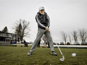 Mark Chen of Lemoine tees off on the first hole at Club-de-Golf-St-Polycarpe in St-Polycarpe, west of Montreal, on Friday, Dec. 25, 2015.