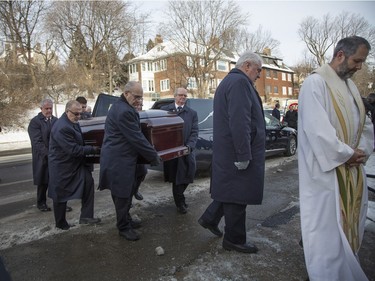 MONTREAL, QUE.: DECEMBER 28, 2015 -- Pall bearers carry the casket with Hab legend Dickie Moore, at Mountainside United Church for the funeral of  in Montreal, Monday December 28, 2015.  (Vincenzo D'Alto / Montreal Gazette)