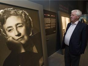 Mathew Prichard, grandson of crime writer Agatha Christie, beside an image of her at the opening of an exhibition called Investigating Agatha Christie at the Pointe-à-Callière Archaeology and History Complex in the Old Montreal area of Montreal Tuesday, Dec. 8, 2015. The exhibition explores her life and interest in archaeology, stemming from her marriage to an archaeologist who helped excavate ancient ruins in Mesopotamia, now Iraq.