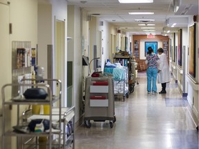 Nurses speak in the hallway at the Balfour M. Mount Palliative Care Unit of the Montreal General Hospital in 2014.