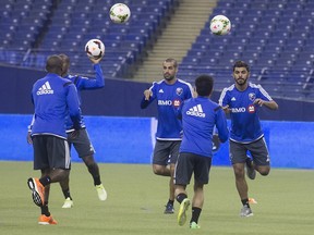 Members of the Impact go through their first practice of training camp in Montreal on  January 23, 2015. The club announced its 2016 home opener will be played on Saturday, March 12, at Olympic Stadium.