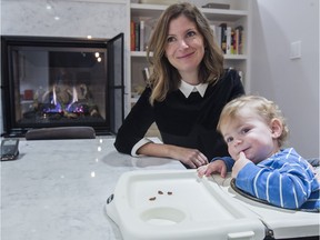 Véronique Saine and her son Romeo in the kitchen of their home in Outremont. (Pierre Obendrauf / MONTREAL GAZETTE)