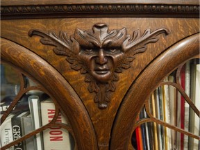 A detail on a bookcase in the home of Will Rafuse and Kim Johnson in Montreal. The couple came from Vancouver in 2006 to "start a new adventure" in Montreal. He's an artist. She works in a major hospital. They live on the middle floor of an 1875 triplex that was once a single unit. (John Kenney / MONTREAL GAZETTE)