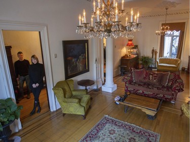 Kim Johnson and Will Rafuse in their home. They live on the middle floor of an 1875 triplex that was once a single unit. (John Kenney / MONTREAL GAZETTE)