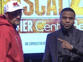 Boxers Sergey Kovalev, left, and Jean Pascal  during media event in Montreal on Monday November 30, 2015. Pascal called Kovalev a racist while taking to the media.