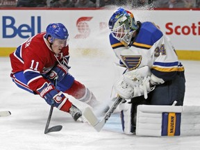 Canadiens sparkplug Brendan Gallagher hits the brakes as he looks for a rebound from St. Louis Blues' Jake Allen in Montreal on Oct. 20, 2015.