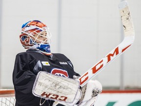 "I’ve been trying to be a good leader and role model and help the (IceCaps) play well,” says Canadiens goalie Dustin Tokarski, taking part in Canadiens practice at the Bell Sports Complex in Brossard on Sept. 30, 2015.