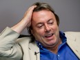 Author Christopher Hitchens answers a question during interview in Montreal September 23, 2008.