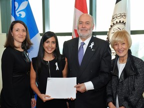 From left to right, Nathalie Provost, Polytechnique graduate injured during the 1989 tragedy and "Godmother" of the Order of the White Rose; Tara Gholami, first recipient of the Order of the White Rose scholarship; Christophe Guy, CEO of Polytechnique; Michèle Thibodeau-DeGuire, Principal and Chair of the Polytechnique board of directors, and chair of the selection jury for the Order of the White Rose scholarship.  Tara Gholami is the first recipient of the Order of the White Rose scholarship
