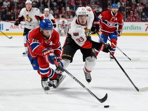 Andrei Markov of the Montreal Canadiens defends the puck against Mika Zibanejad of the Ottawa Senators during the NHL game at the Bell Centre on Dec. 12, 2015, in Montreal.