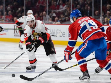 Mika Zibanejad #93 of the Ottawa Senators tries to get the puck past Andrei Markov #79 of the Montreal Canadiens during the NHL game at the Bell Centre on December 12, 2015, in Montreal.