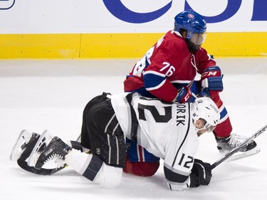 Los Angeles Kings' Marian Gaborik is dumped by Montreal Canadiens' P.K. Subban during first period NHL hockey action, in Montreal, on Thursday, Dec. 17, 2015.