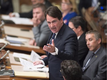 Quebec Opposition Leader Pierre-Karl Peladeau inquires about the fiscal system to Premier Philippe Couillard, during question period, Wednesday, September 23, 2015 at the legislature in Quebec City.