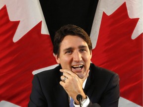 Prime Minister Justin Trudeau speaks with reporters during an interview with The Canadian Press in Ottawa on Wednesday, December 16, 2015.