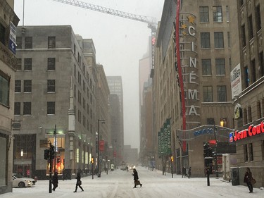 A snowy view of Montreal looking north past Ste-Catherine St. on Metcalfe St.