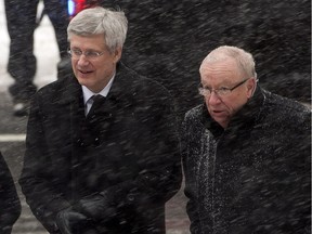 Stephen Harper arrives with Senator Jacques Demers at the funeral service for Jean Béliveau, December 10, 2014 in Montreal.