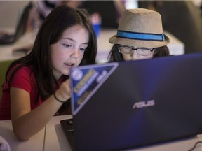 Students attend the Girls Learning Code computer workshop in Toronto in 2014.