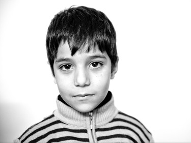 Syrian refugee Tammim, 6, from Kherbet Ghazala, Syria is seen Monday, November 30, 2015 in Irbid, Jordan. His family is waiting for final approval to immigrate to Canada.