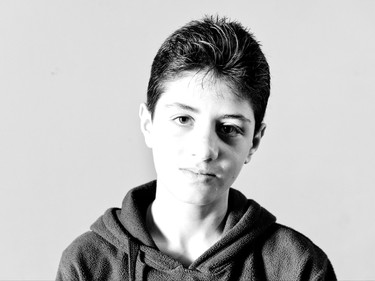 Syrian refugee Salah, 13, from Bossalharir, Syria is seen Tuesday, December 1, 2015 in Irbid, Jordan. His family is waiting for final approval to immigrate to Canada.