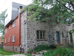 The exterior of the N.D.G. duplex owned by Julie Trudel and husband Jason MacRae. The cube extension they added can be seen on the roof at the rear of the building. (Photo courtesy of Julie Trudel)