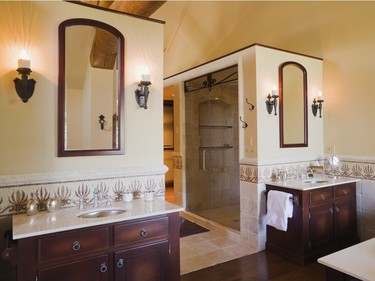 The original master bedroom en suite is glamorous with a Spanish flair. (Photo by Perry Mastrovito)