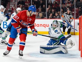 Max Pacioretty of the Montreal Canadiens gets the puck past goaltender Jacob Markstrom of the Vancouver Canucks and scores at the Bell Centre on Nov. 16, 2015. Pacioretty is scoring one goal for about every 10 shots, translating to 9.4 per cent shooting percentage, which ranks 247th in the NHL.