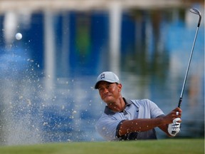 Tiger Woods posted a 13-second video on Twitter that shows him dressed in shorts and golf shoes, and he takes a smooth swing on a golf simulator.