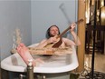 In the video installation titled The Visitors, Ragnar Kjartansson is seen soaking in a bathtub, in a house full of musicians playing in separate rooms. His work is on display Feb. 11 through to May 22 at the Musée d'art contemporain de Montréal.