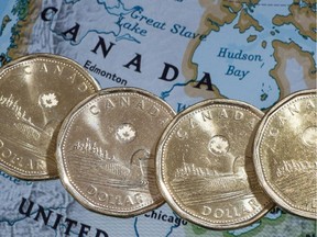 File photo of Canadian dollar coins, or Loonies.