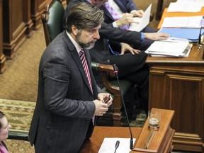 Projet Montréal leader Luc Ferrandez asks a question during a city council meeting at city hall in Montreal on Monday Dec.14, 2015.