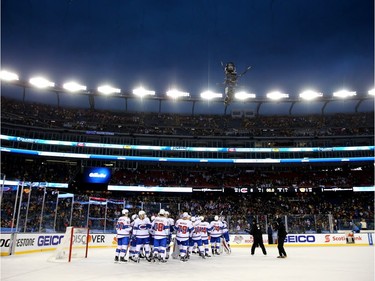 The Montreal Canadiens celebrate after defeating the Boston Bruins during the 2016 Bridgestone NHL Winter Classic at Gillette Stadium on January 1, 2016, in Foxboro, Massachusetts. The Canadiens defeated the Bruins 5-1.