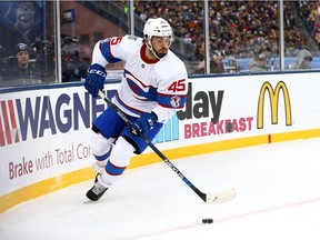 Canadiens defenceman Mark Barberio controls the puck against the Boston Bruins during the NHL Winter Classic at Gillette Stadium in Foxborough, Mass., on Jan. 1, 2016.
