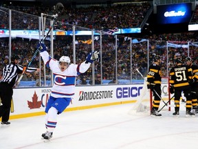 Returning hero: Canadiens winger Brendan Gallagher celebrates after scoring his team's third goal against the Boston Bruins in the second period during the 2016 Bridgestone NHL Winter Classic at Gillette Stadium on Jan. 1, 2016 in Foxborough, Mass.